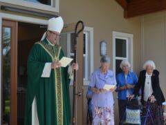 Bishop Gregory Parkes offers prayer of blessing on the new wing at Holy Name Monastery.